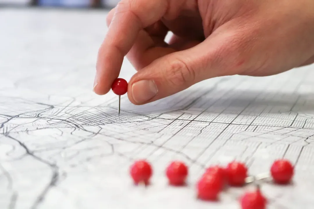 city map with pins indicating rental properties and locations