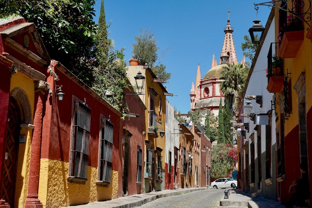 Colourful colonial street in Merida Yucatan Mexico in bright sun